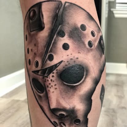 Black and grey realism Jason Voorhees hockey mask tattoo