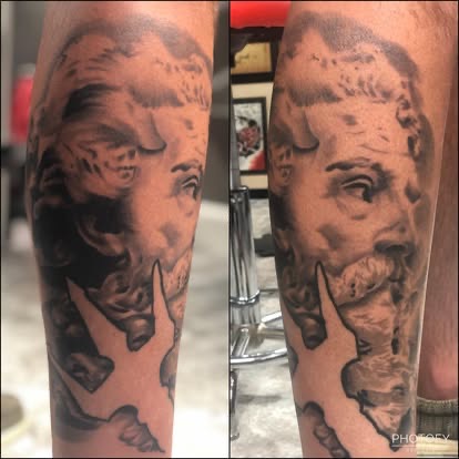 Black and grey realism bearded statue portrait tattoo on the leg