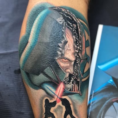 Color realism damaged Darth Vader helmet tattoo on the forearm