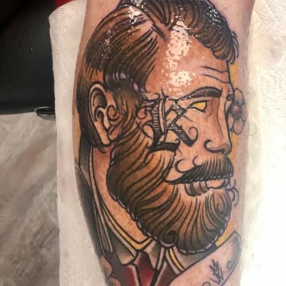 Neo-traditional color portrait of a bearded gentleman tattoo
